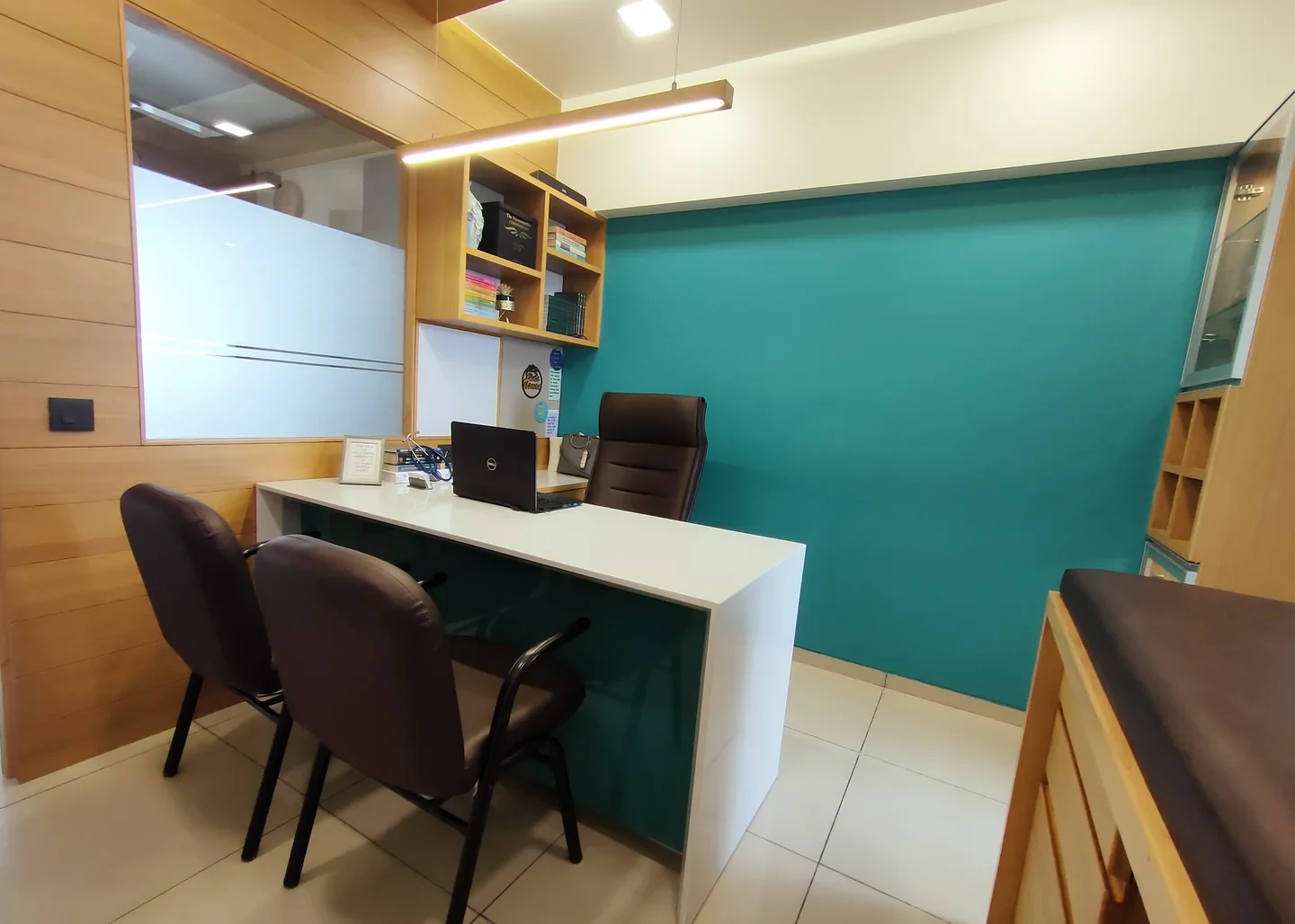 The consulting room at Aayat Homœopathic Clinic with turquoise wall
